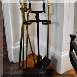 D02. Brass and iron fireplace tools. 